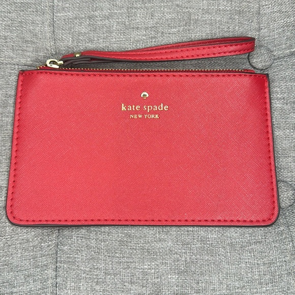 kate spade Handbags - Kate Spade Wristlet in Red Leather- EUC ♥️
